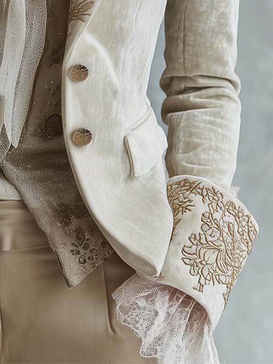 Getailleerde ivoorkleurige blazer met borduurwerk