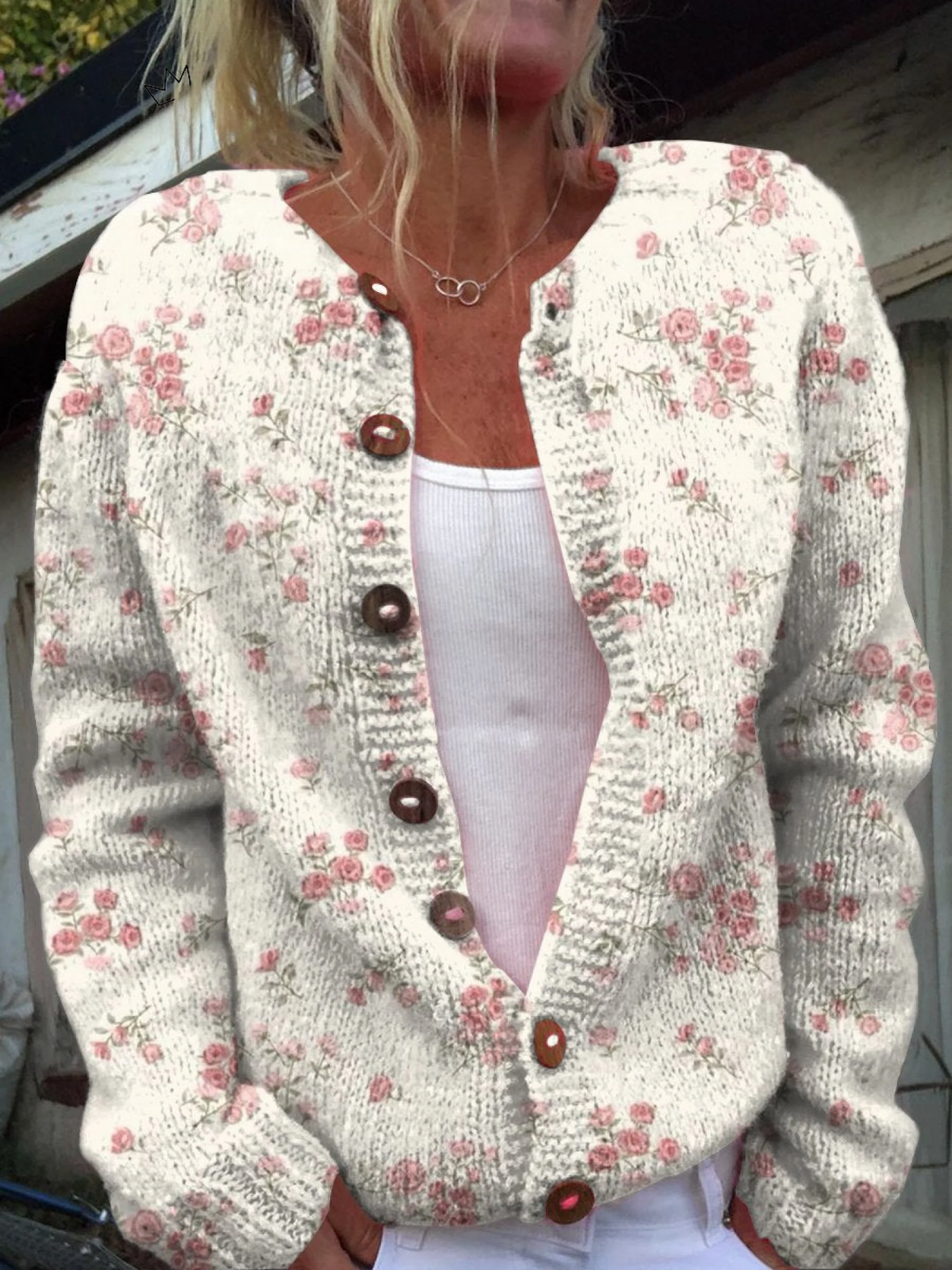 Gebreid vest met roze rozenprint