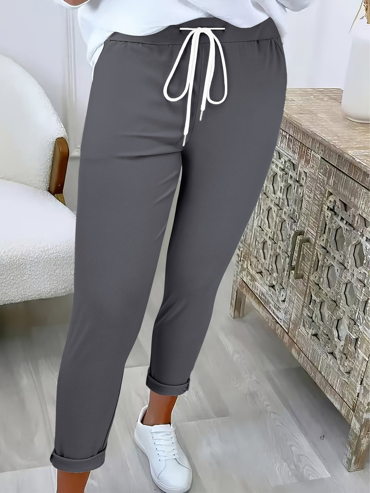 MODERNE BROEK MET TREKKOORD VOOR DAMES