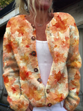 Gebreid vest met esdoornbladprint