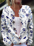Vest met bloemen- en vogelprint