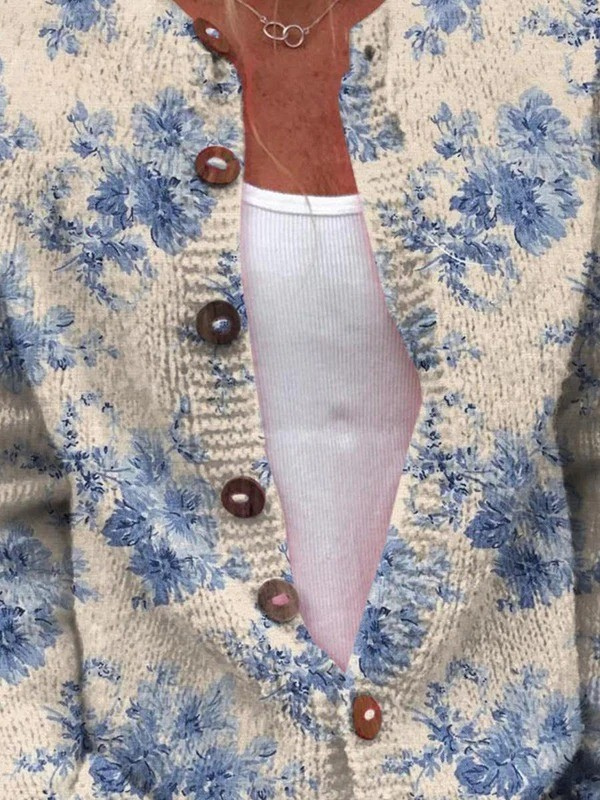 Gebreid vest met blauwe bloemenprint