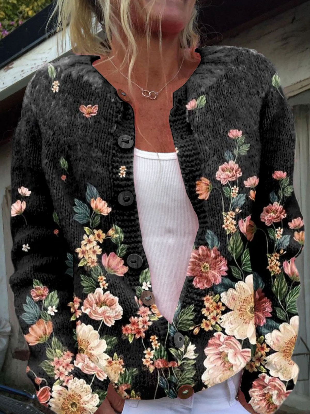 Zwart vest met bloemenprint