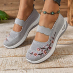 MET BLOEMEN GEBORDUURDE SNEAKERS VOOR DAMES
