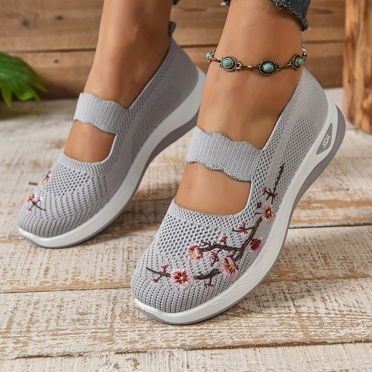 MET BLOEMEN GEBORDUURDE SNEAKERS VOOR DAMES