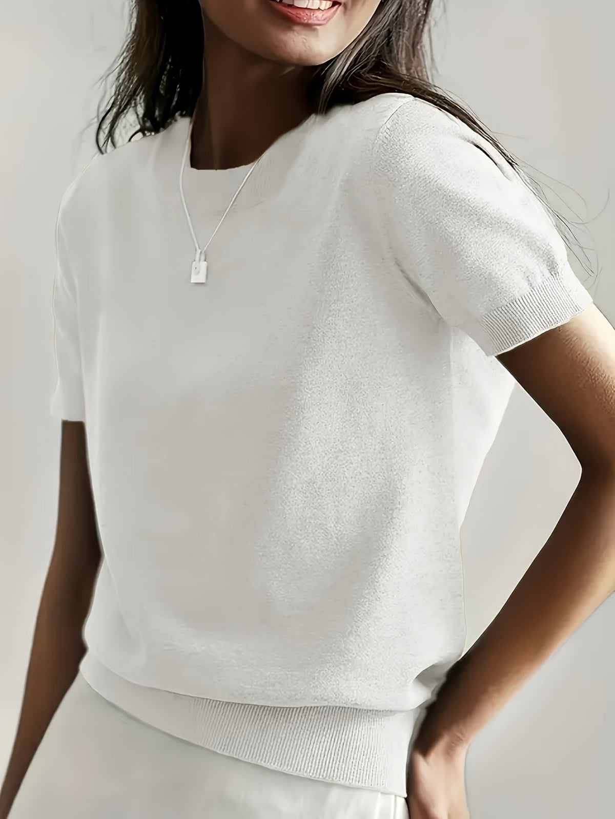 DAMES TOP MET KORTE MOUWEN