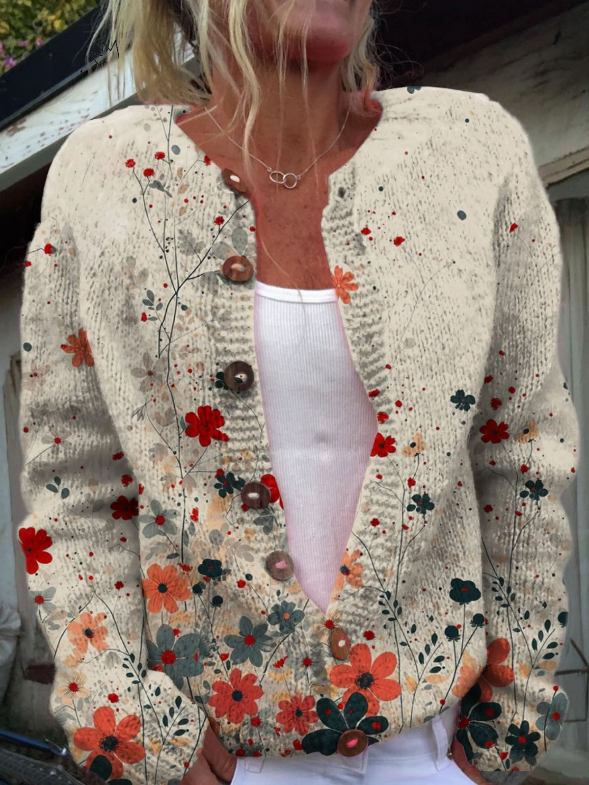 Gebreid vest met rode bloemenprint