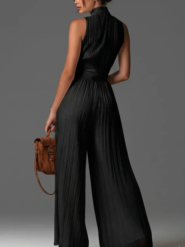 GEPLOOIDE JUMPSUIT MET HALTERNEK VOOR DAMES