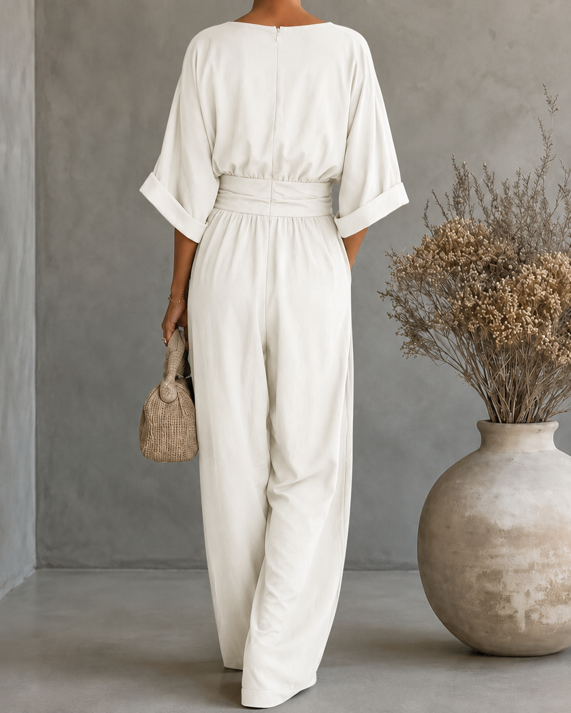 JUMPSUIT MET V-HALS EN BREDE PIJPEN VOOR DAMES