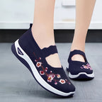 MET BLOEMEN GEBORDUURDE SNEAKERS VOOR DAMES
