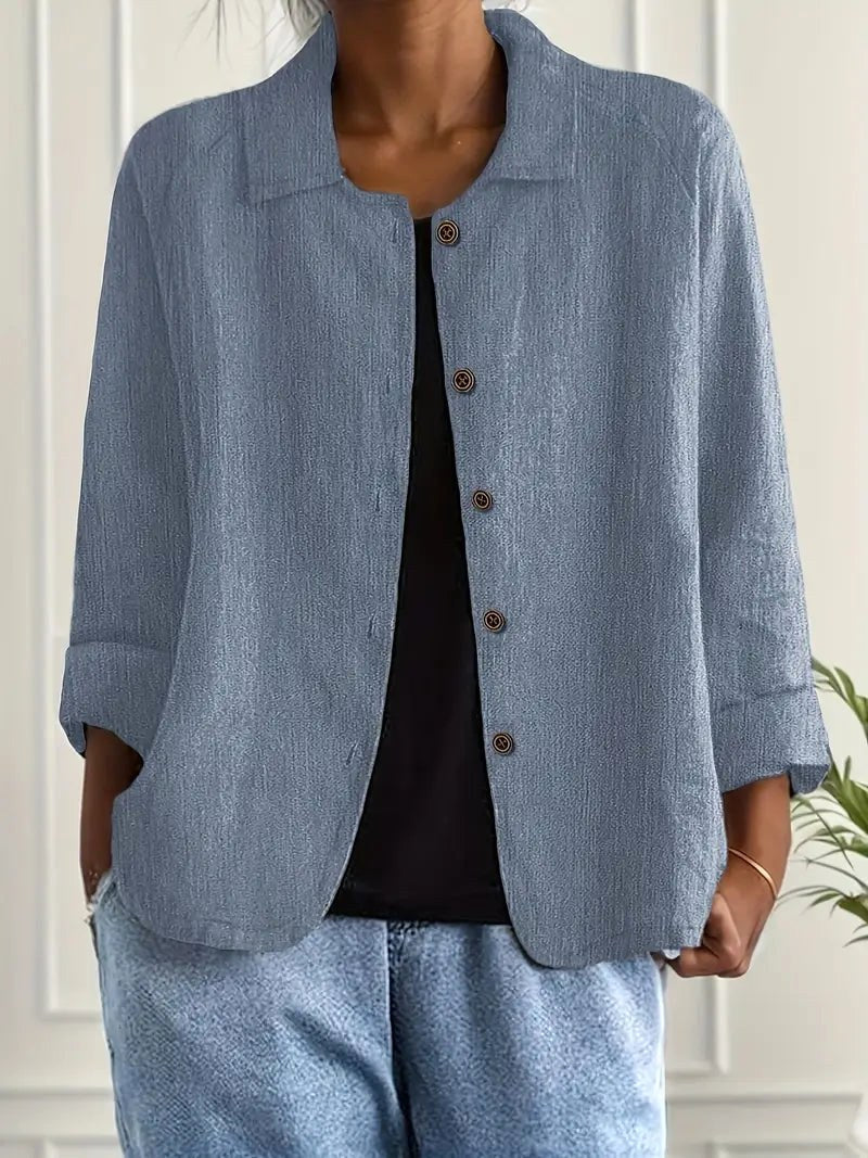Verfijnd jasje met knoopsluiting in blauw