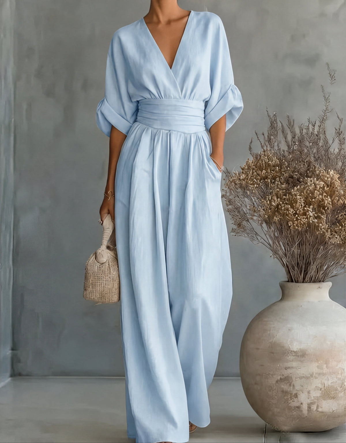 JUMPSUIT MET V-HALS EN BREDE PIJPEN VOOR DAMES