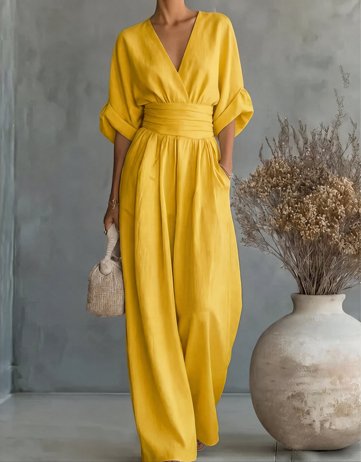 JUMPSUIT MET V-HALS EN BREDE PIJPEN VOOR DAMES