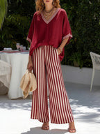 TWEEDELIGE SET MET V-HALS TOP EN BREDE BROEK VOOR DAMES